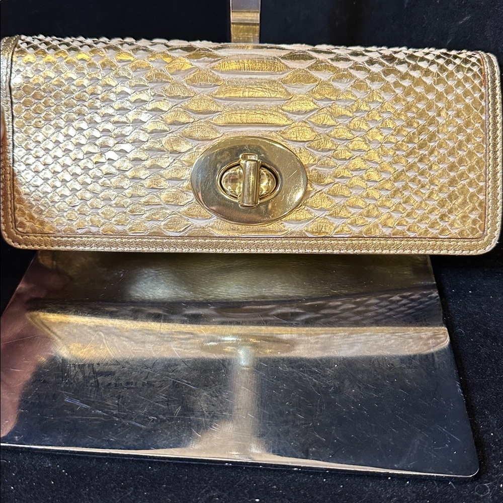 Coach “65” Anniversay Legacy Gold Snake-Embossed  Clutch
